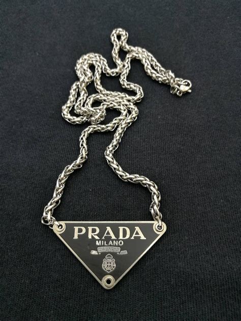 silver prada necklace|prada necklace triangle pendant.